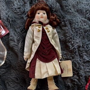 Elegant Cream and Burgundy Porcelain Doll